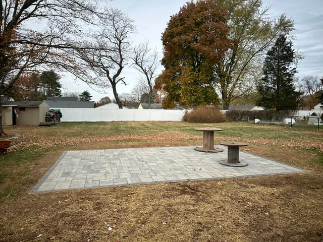 Paver patio pad installation in backyard